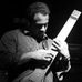 Darren Joy - Stickist/Bassist - Facebook
